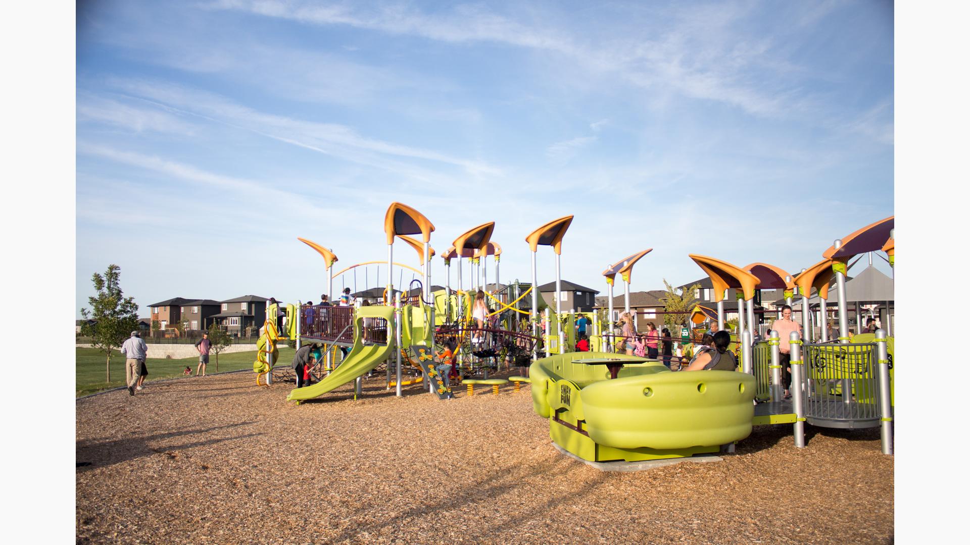 Norseman Park, Regina, SK includes inclusive PlayBooster® play structure whcih offers accessible ramps. Kids can access the Sway Fun® glider, the slides, overhead events, nets, and sensory play panels.For kids ages 5 to 12, a Motion Smart Play® play structure for toddlers and preschoolers was included.