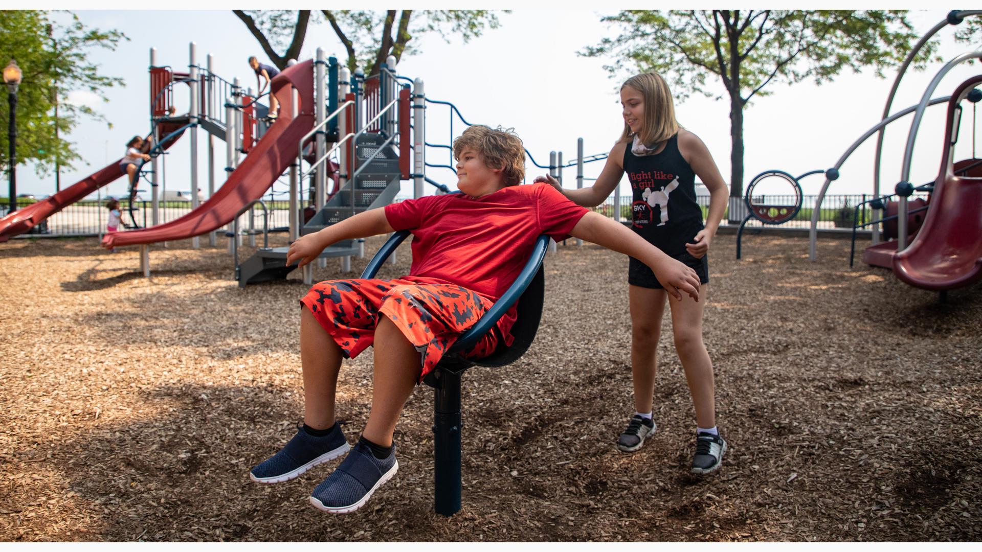 Boy sitting in chill spinner