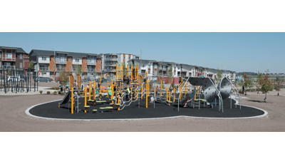 On a bright and sunny day children play at Harvest Hills Park. Climbing the 7-post Netplex play system and the 12-panel Mobius climber.