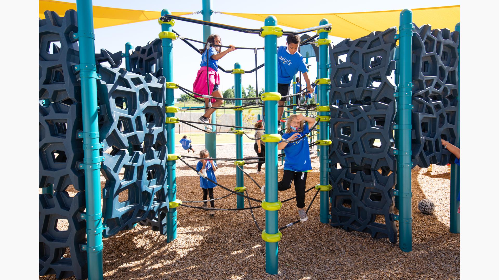 Children climbing Geoplex Navigator Climber