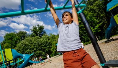 Girl using the Horizontal Ladder