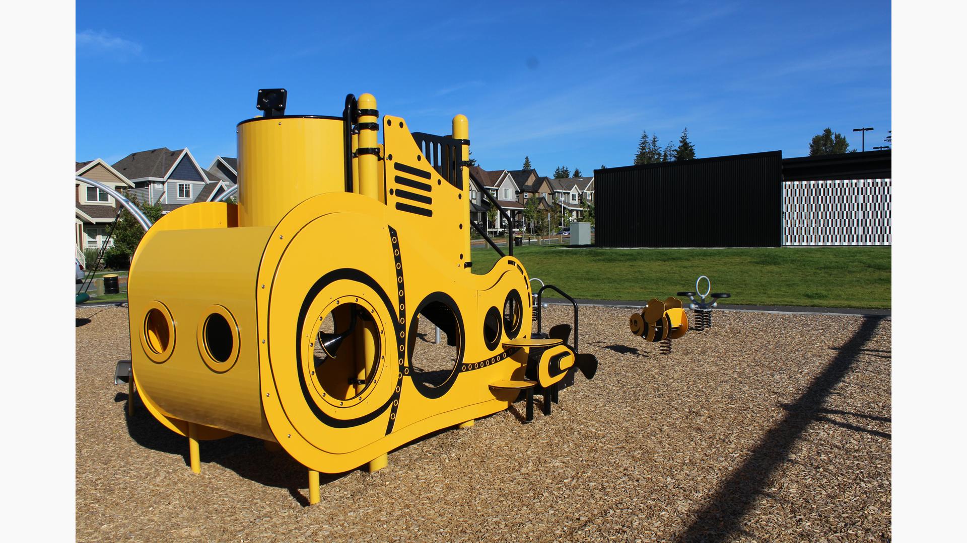 Custom submarine play structure with Digirider Bumble Bee and Bobble Rider Double