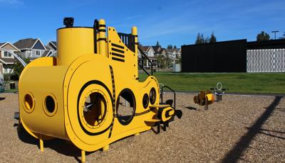 Custom submarine play structure with Digirider Bumble Bee and Bobble Rider Double