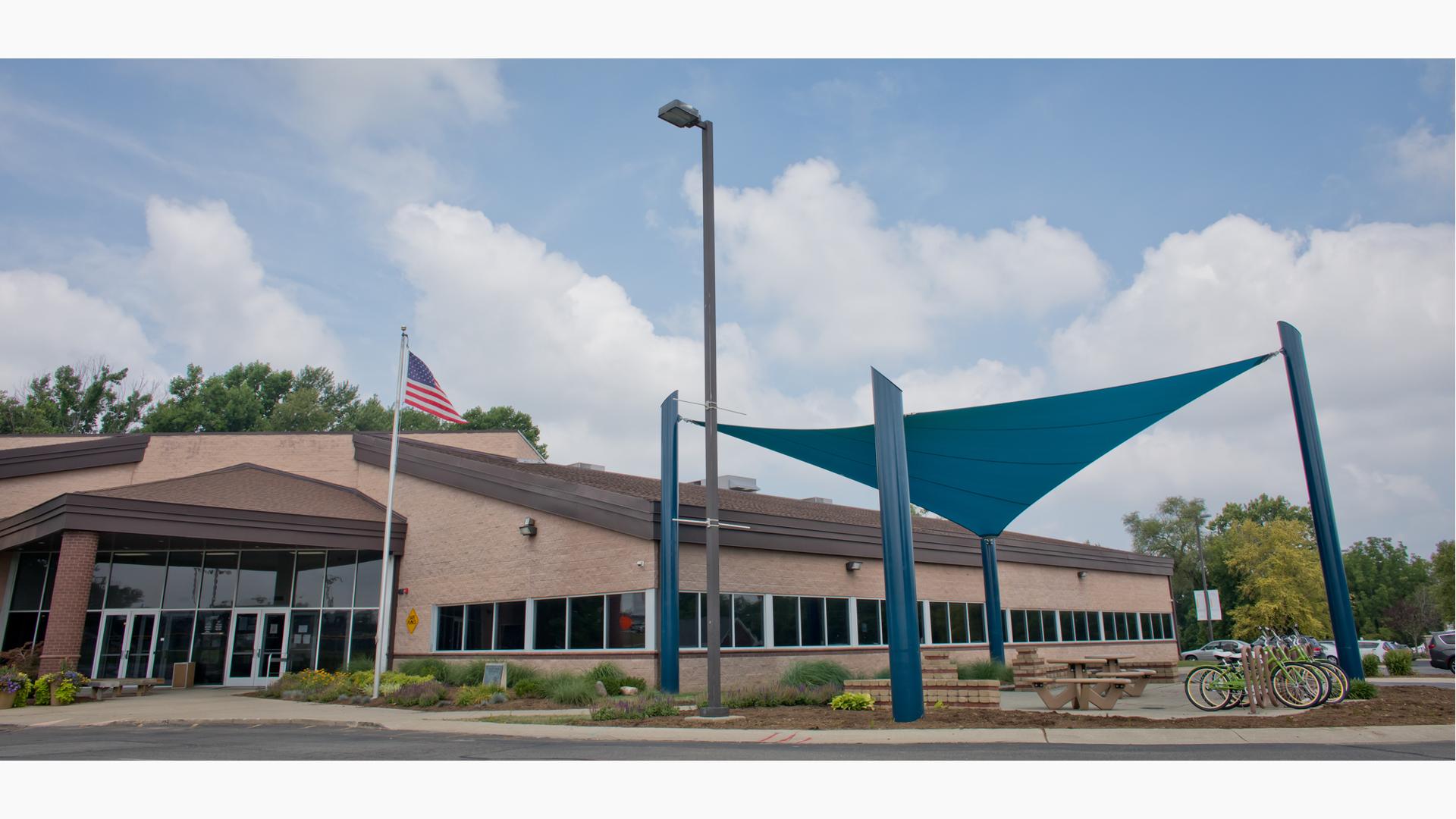 A custom SkyWays shade product installed for Greenwood Community Center designed to block up to 97 percent of the sun's UV rays.