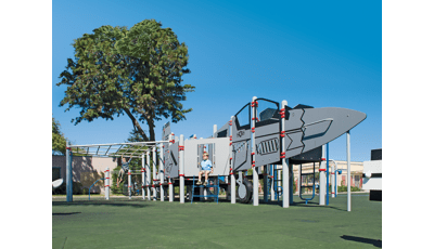 An authentic F-6 Skyray jet fighter—we created a fighter jet using Permalene® panels, as well as a custom PlayBooster® playstructure offers kids ages 5 to 12 fun new opportunities for challenging, imaginative play. The jet fighter theme is carried throughout the playground.