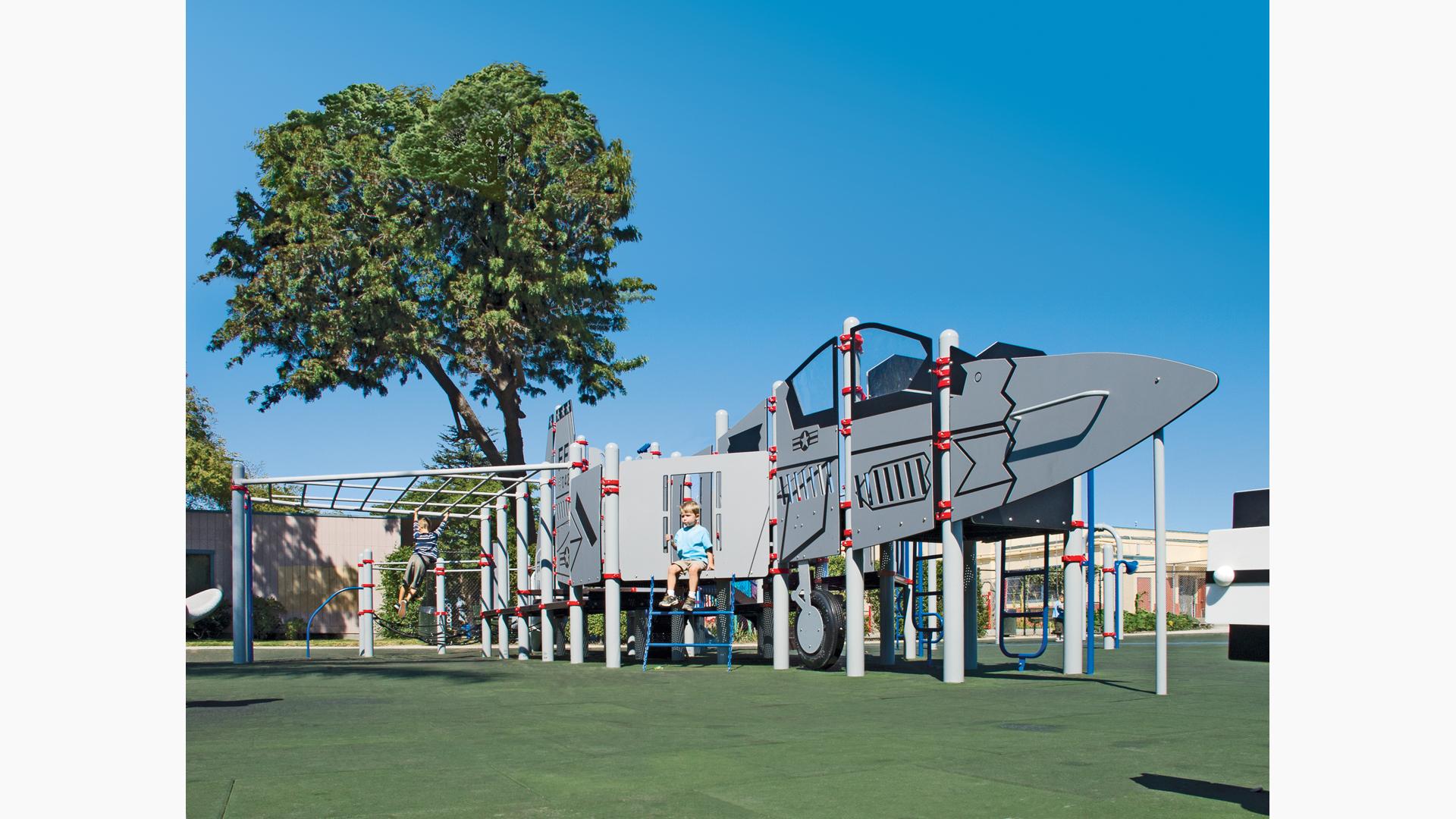 An authentic F-6 Skyray jet fighter—we created a fighter jet using Permalene® panels, as well as a custom PlayBooster® playstructure offers kids ages 5 to 12 fun new opportunities for challenging, imaginative play. The jet fighter theme is carried throughout the playground.