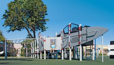 An authentic F-6 Skyray jet fighter—we created a fighter jet using Permalene® panels, as well as a custom PlayBooster® playstructure offers kids ages 5 to 12 fun new opportunities for challenging, imaginative play. The jet fighter theme is carried throughout the playground.