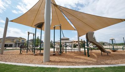 Shade sails covering playground.