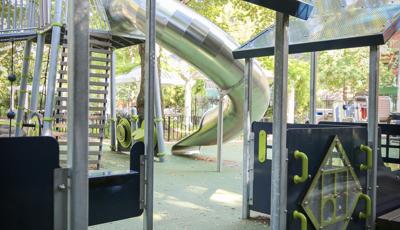 Stainless steel Play Booster tunnel slide at Joseph C. Sauer Park