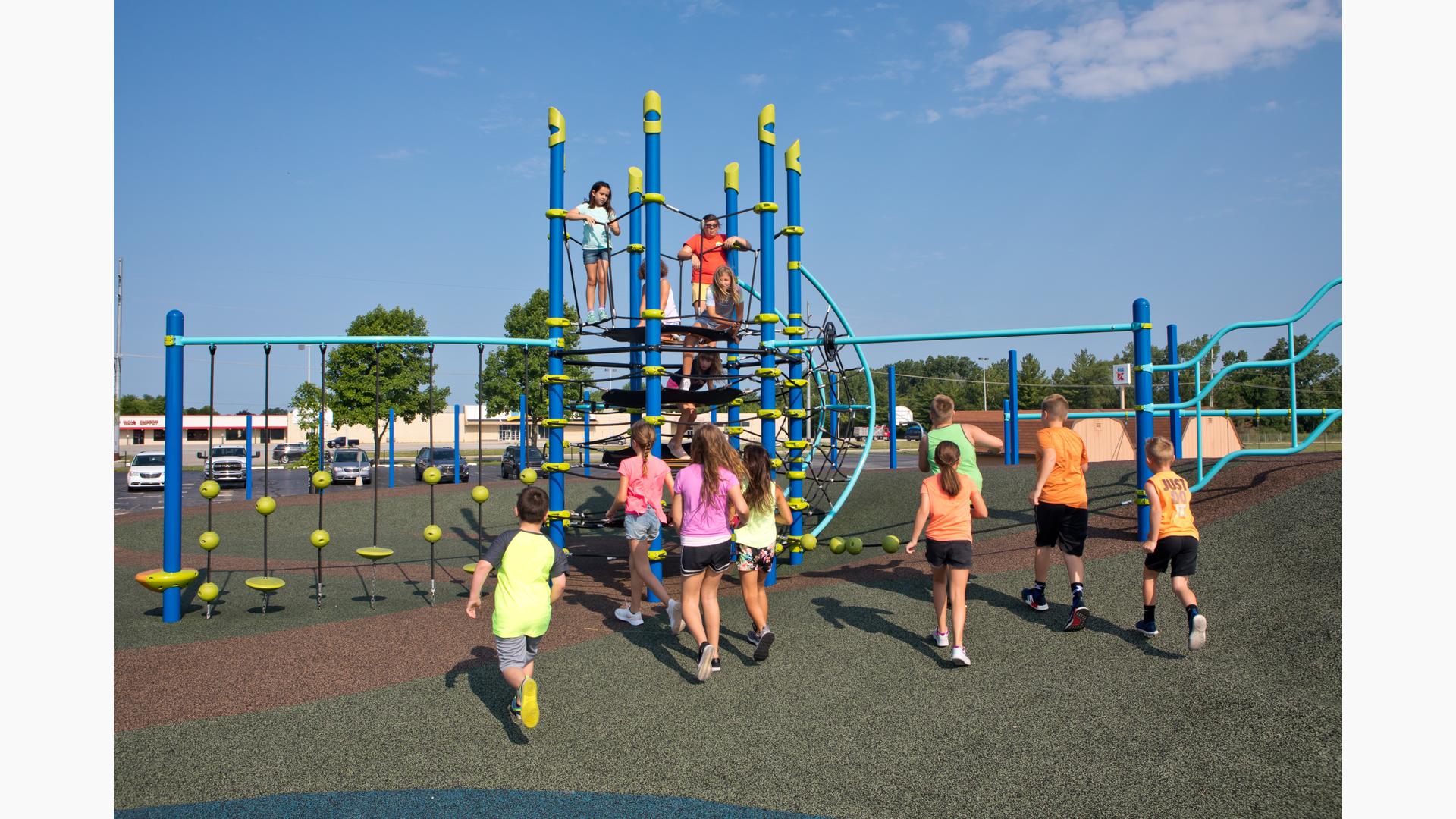 Kids playing around Netplex® play structure