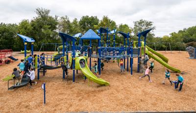 Kids at Scenic Heights Elementary School  enjoying recess with new PlayBooster playscape.