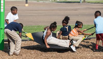 Children playing on Boogie board