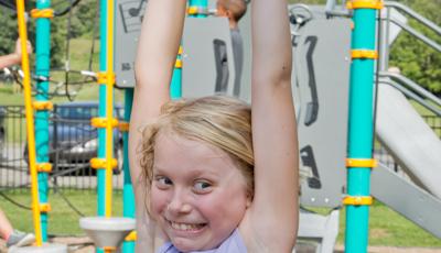 Girl hanging from Track Ride