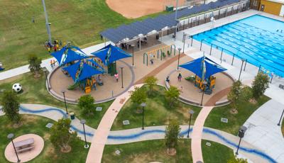 Nestled between a baseball field and an olympic size swimming pool, Woodland Hills Park playground is in good company, giving kids access to slides, ramps, climbers...you name it. Each play structure is covered with SkyWays shade panels.