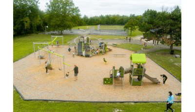 Elevated view of a city park filled with playing children.