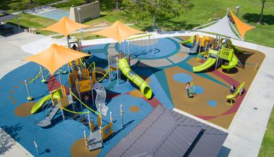 Elevated view of an outdoor city park with uniquely designed safety surfacing.