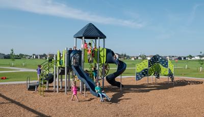 Legacy Park, Fargo, ND features a PlayBooster®  play structure for ages 5 to 12 with a variety of climbers and slides galore. The PlayShaper® play structure is sized right for ages 2 to 5, with slides, climbers and more. As well as a Cascade Climber.