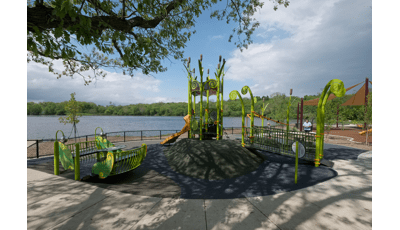 Located along with Huron River, the Gallup Park Rotary Playground a PlayBooster® play structure. A tower play structure mimicking a birds nest for ages 5 to 12. It also features a custom Sway Fun® Glider and concrete-sculpted animals, as well as SkyWays® shade products.
